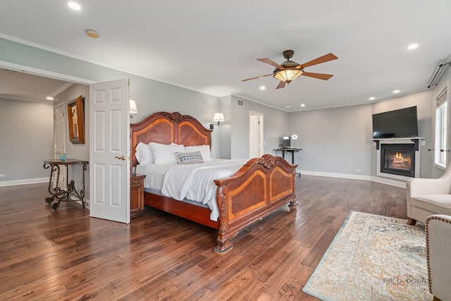 357 Torrey Pines Way, Vernon Hills, IL 60061 - bedroom with wood finished floors, baseboards, crown molding, recessed lighting, and a glass covered fireplace