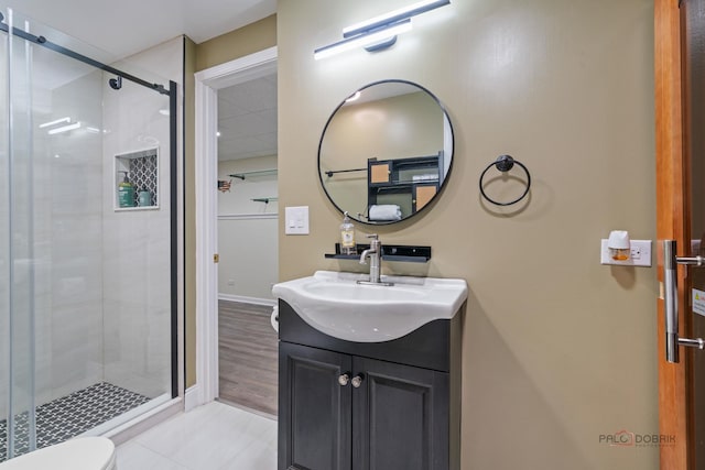 357 Torrey Pines Way, Vernon Hills, IL 60061 - full bathroom with a shower stall, vanity, tile patterned flooring, and toilet