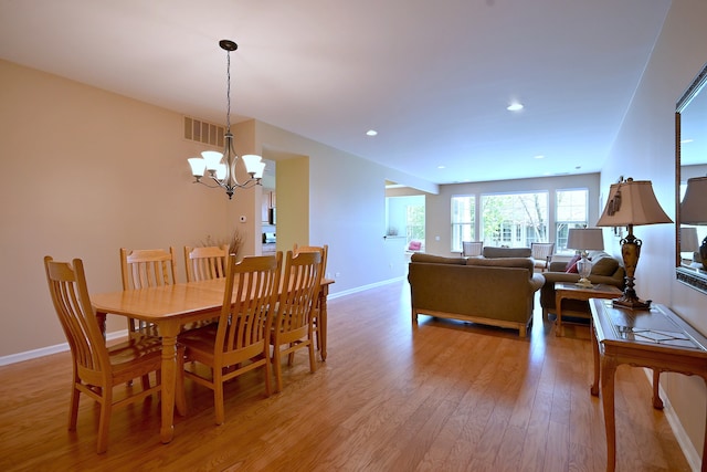 11882 Ludbury, Huntley, IL 60142 - dining room with light wood-style floors, a chandelier, baseboards, and recessed lighting