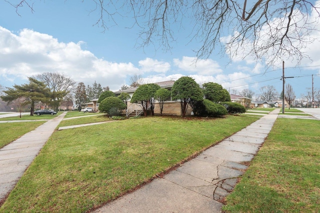view of yard with a residential view