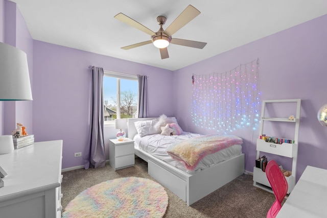 bedroom with carpet flooring, baseboards, and ceiling fan