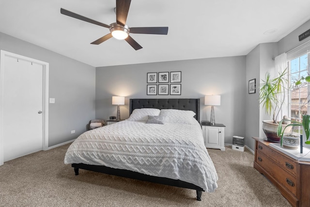 bedroom with baseboards, light colored carpet, and ceiling fan