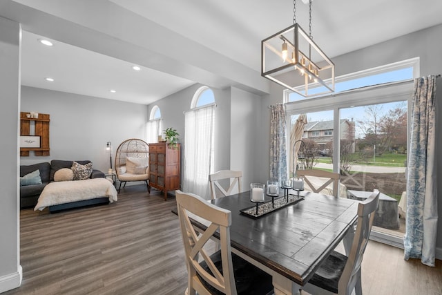 dining space with wood finished floors, recessed lighting, and a healthy amount of sunlight