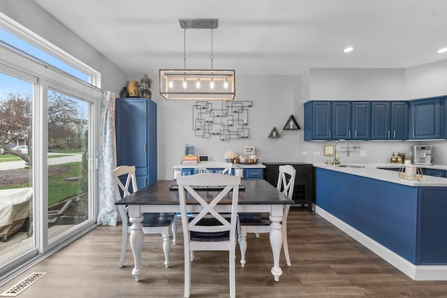 dining room featuring recessed lighting, visible vents, and dark wood-style flooring