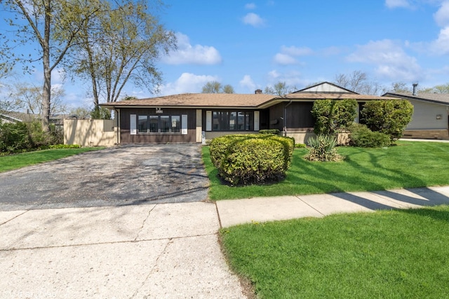 210 Walnut Ln, Elk Grove Village, IL 60007 - ranch-style house with a front lawn and driveway