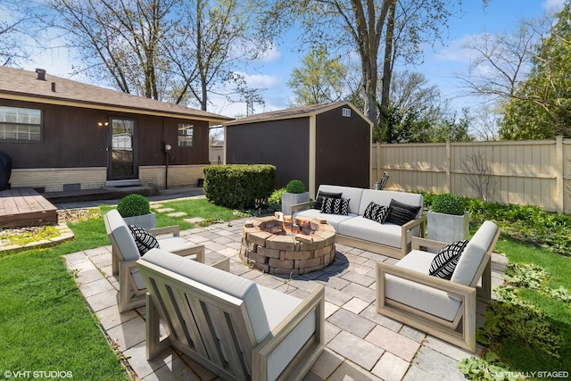 210 Walnut Ln, Elk Grove Village, IL 60007 - view of patio / terrace featuring fence, an outdoor living space with a fire pit, an outdoor structure, and a storage shed