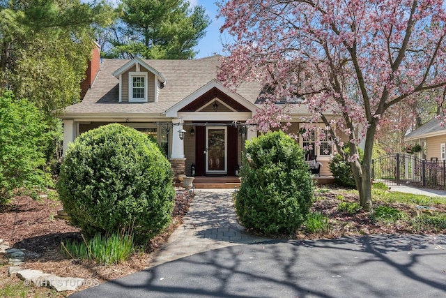 2S283 Rte 59, Warrenville, IL 60555 - view of front of property featuring a shingled roof and a chimney