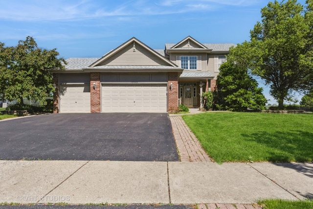 10600 Thornham Ln, Mokena, IL 60448 - view of front of home with a front lawn, driveway, an attached garage, and brick siding