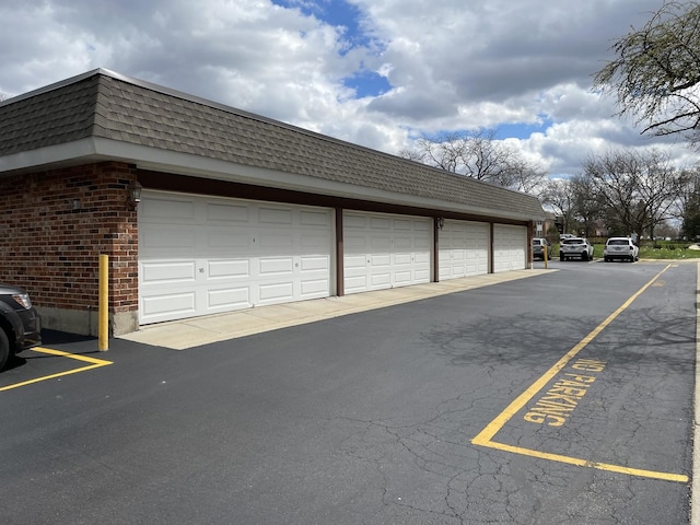 garage with uncovered parking
