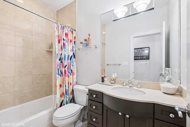 full bathroom with toilet, shower / bath combination with curtain, and vanity