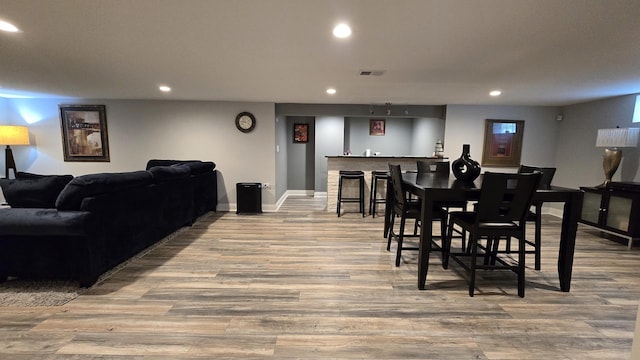 959 E 166th St, South Holland, IL 60473 - dining space with recessed lighting, wood finished floors, visible vents, and bar area
