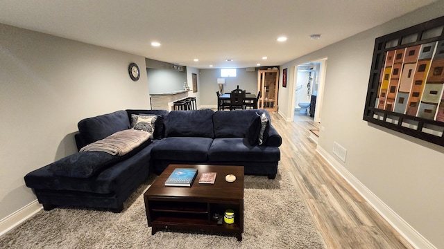 959 E 166th St, South Holland, IL 60473 - living area featuring recessed lighting, wood finished floors, visible vents, and baseboards