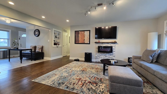 959 E 166th St, South Holland, IL 60473 - living room with a fireplace, baseboards, wood finished floors, and recessed lighting