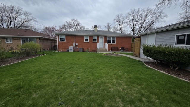 959 E 166th St, South Holland, IL 60473 - rear view of house with brick siding, fence, and entry steps