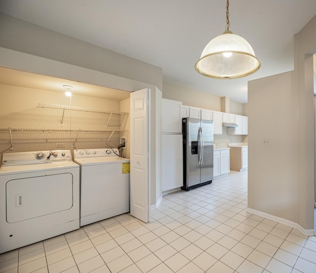 5464 Mayflower Jct, Rolling Meadows, IL 60008 - laundry area with baseboards, light tile patterned floors, laundry area, and independent washer and dryer