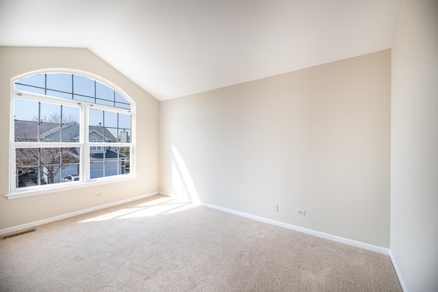 5464 Mayflower Jct, Rolling Meadows, IL 60008 - unfurnished room with visible vents, carpet flooring, vaulted ceiling, and baseboards