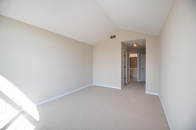 5464 Mayflower Jct, Rolling Meadows, IL 60008 - spare room featuring lofted ceiling, light colored carpet, visible vents, and baseboards