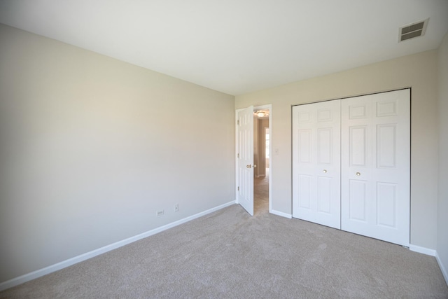 5464 Mayflower Jct, Rolling Meadows, IL 60008 - unfurnished bedroom featuring baseboards, visible vents, carpet floors, and a closet