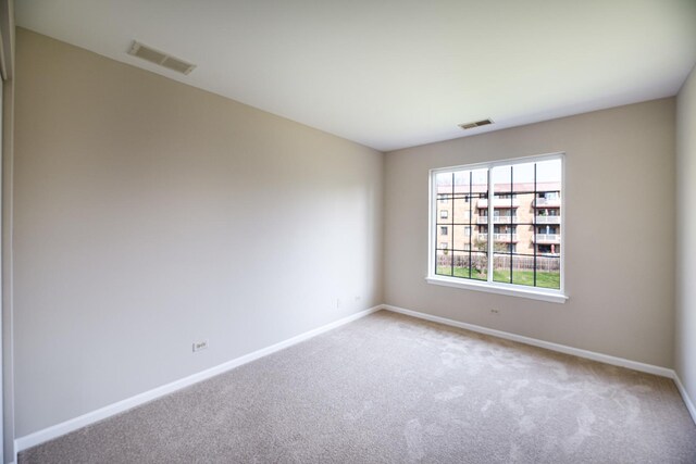 5464 Mayflower Jct, Rolling Meadows, IL 60008 - carpeted empty room featuring visible vents and baseboards