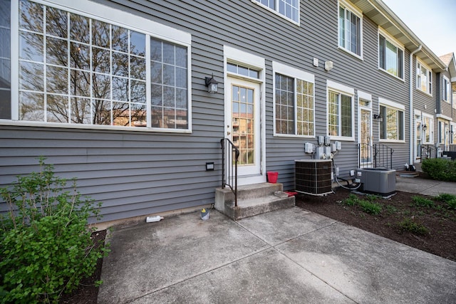 5464 Mayflower Jct, Rolling Meadows, IL 60008 - exterior space with a patio, entry steps, and cooling unit