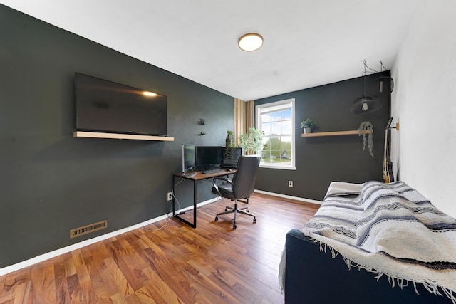 4240 Hearthstone Ln, Belvidere, IL 61008 - office featuring baseboards, visible vents, and wood finished floors