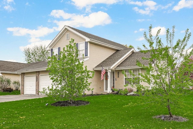 4240 Hearthstone Ln, Belvidere, IL 61008 - view of front of property with a front yard, a shingled roof, aphalt driveway, and a garage