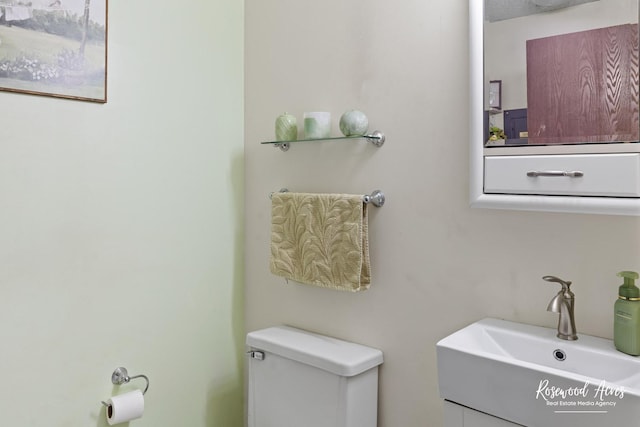 half bath with toilet and vanity