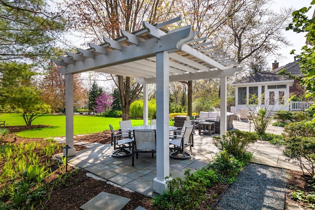 view of patio featuring an outdoor hangout area, a pergola, an outdoor structure, and outdoor dining space