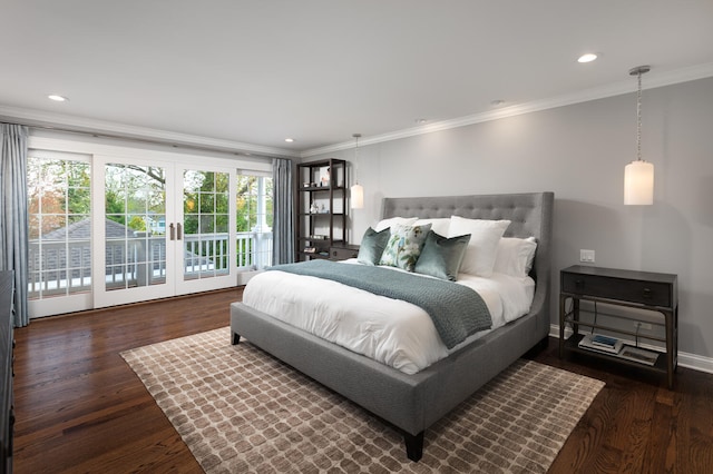 bedroom featuring crown molding, baseboards, french doors, and wood finished floors