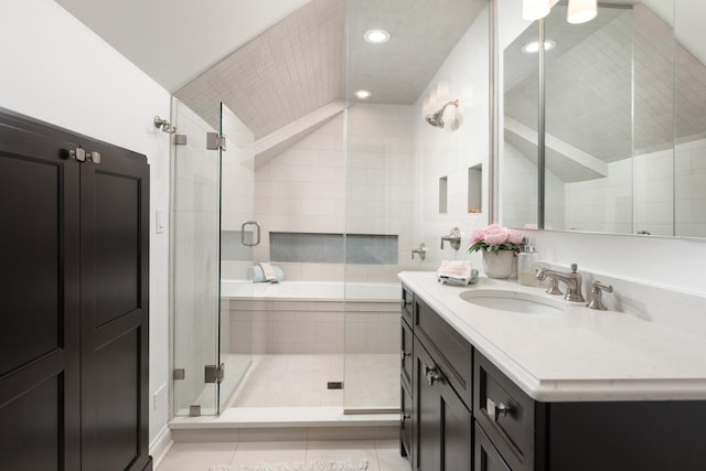 bathroom featuring recessed lighting, a shower stall, tile patterned flooring, and vanity
