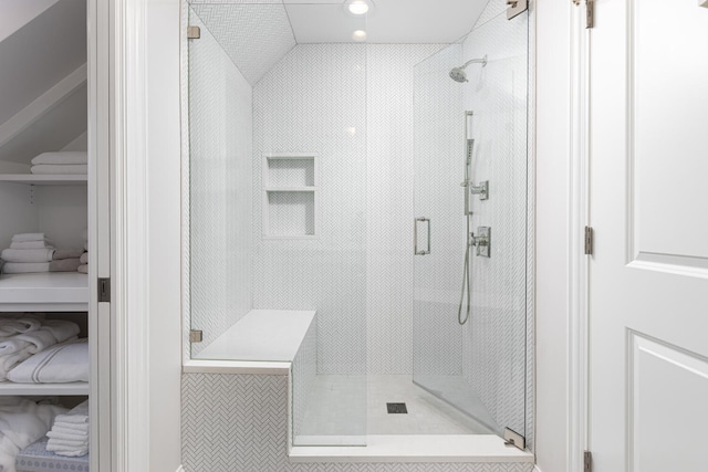 bathroom with recessed lighting and a stall shower