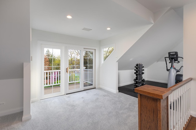 interior space with baseboards, recessed lighting, and visible vents