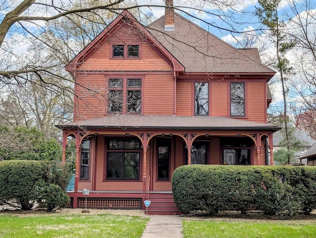 907 W Church St, Champaign, IL 61821 - victorian-style house featuring a porch and a chimney
