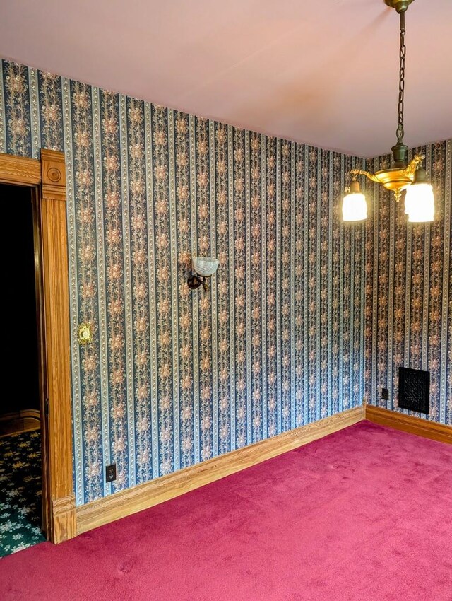 907 W Church St, Champaign, IL 61821 - carpeted spare room featuring wallpapered walls