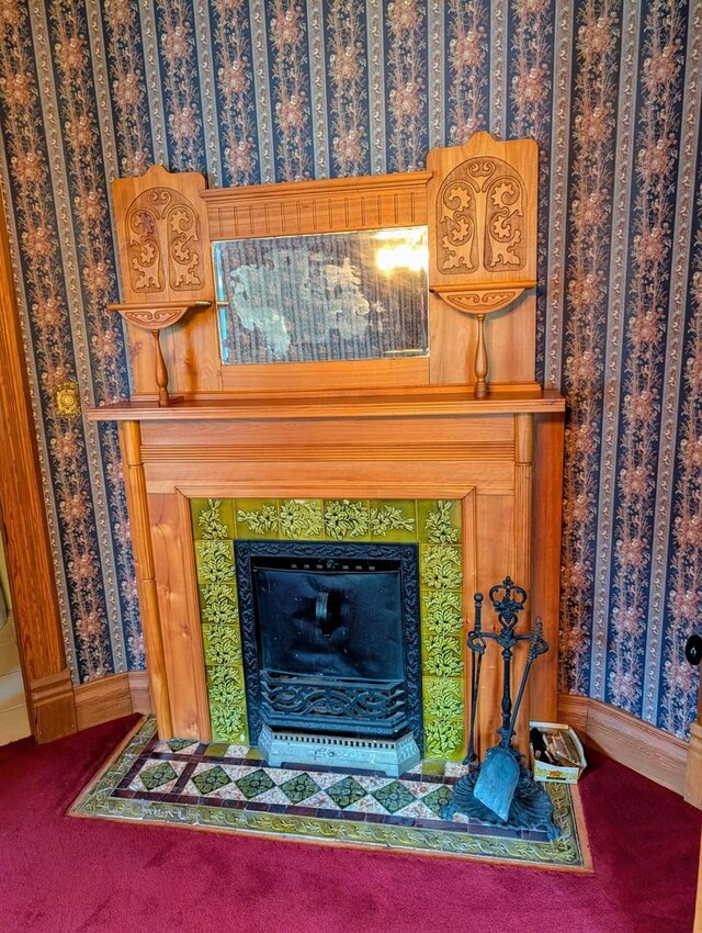 907 W Church St, Champaign, IL 61821 - detailed view of wallpapered walls, a tile fireplace, and carpet floors