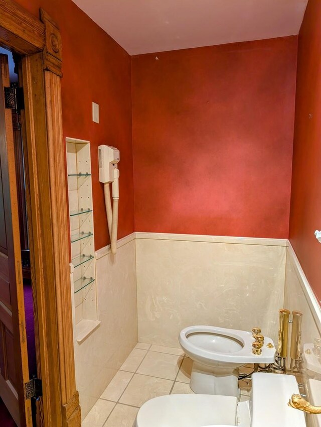 907 W Church St, Champaign, IL 61821 - bathroom with toilet and tile patterned flooring