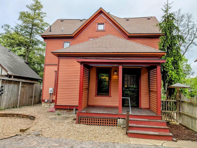 907 W Church St, Champaign, IL 61821 - rear view of house with a shingled roof