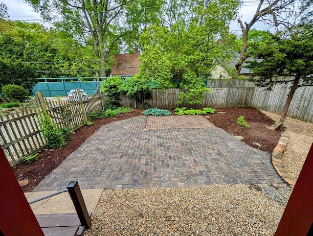 907 W Church St, Champaign, IL 61821 - fenced backyard with a patio