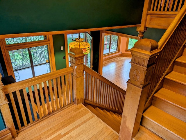907 W Church St, Champaign, IL 61821 - staircase featuring wood finished floors