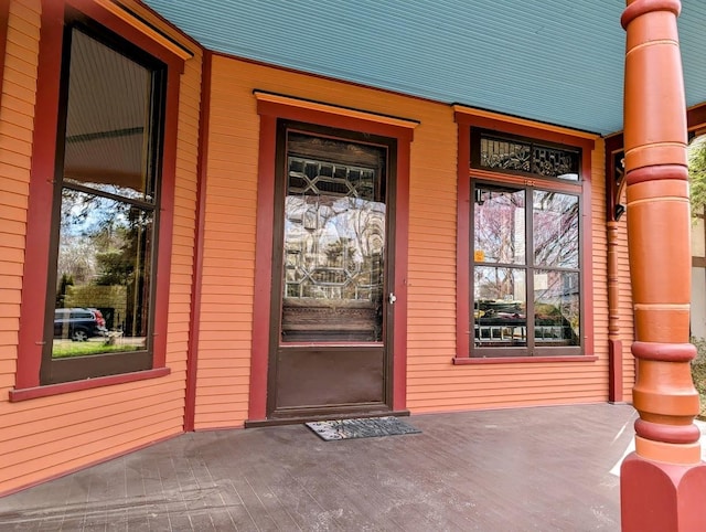 907 W Church St, Champaign, IL 61821 - doorway to property featuring a porch
