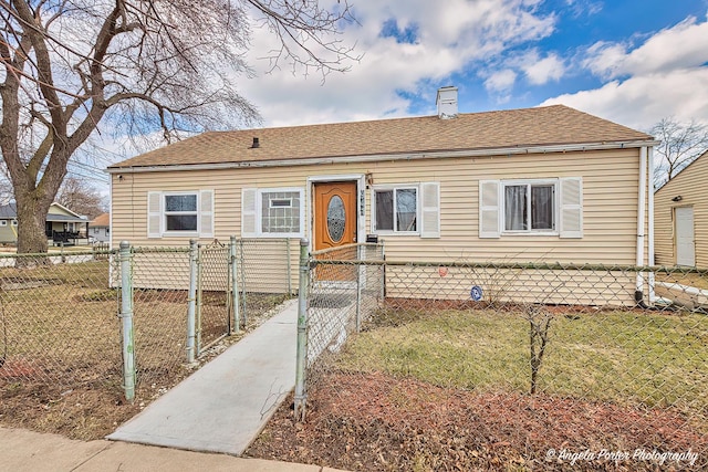 view of front of property featuring a chimney, a gate, a fenced front yard, roof with shingles, and a front yard