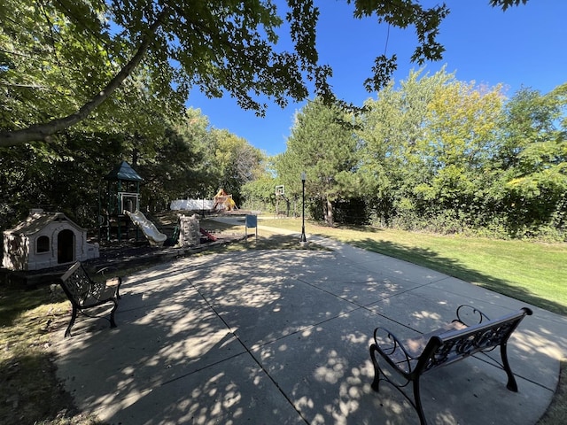 view of patio featuring a playground