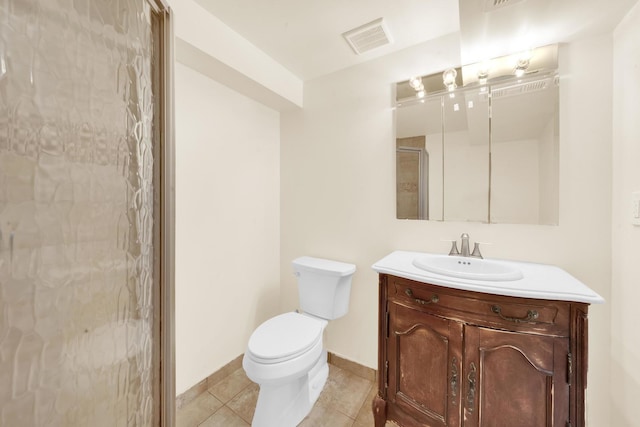 bathroom featuring tile patterned floors, visible vents, toilet, vanity, and a shower