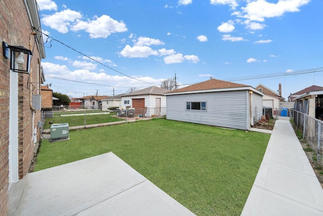 view of yard featuring a fenced backyard, a patio area, and cooling unit