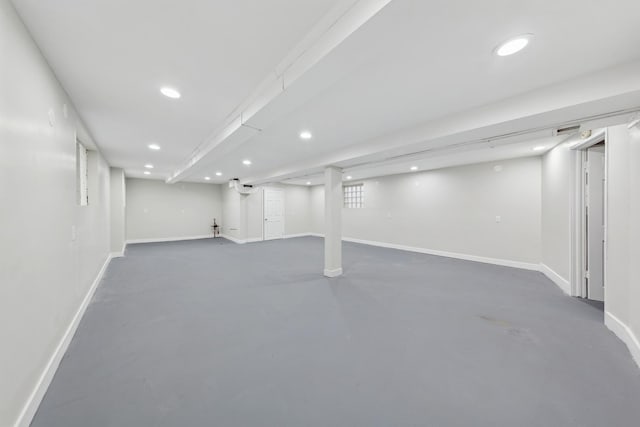 finished below grade area with recessed lighting and baseboards