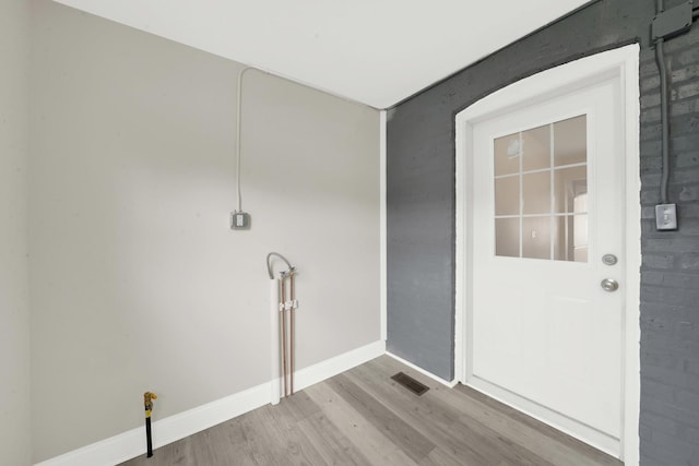 3435 W 71st Pl, Chicago, IL 60629 - washroom with visible vents, wood finished floors, and baseboards