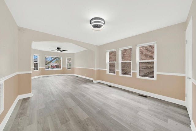 3435 W 71st Pl, Chicago, IL 60629 - unfurnished living room with baseboards, visible vents, wood finished floors, and ceiling fan