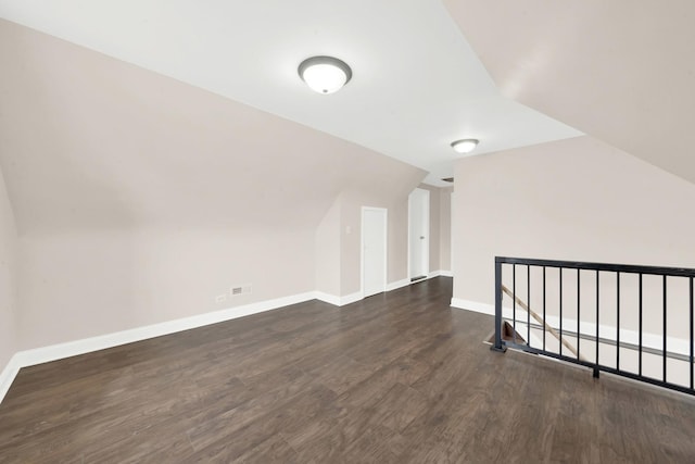 3435 W 71st Pl, Chicago, IL 60629 - additional living space featuring lofted ceiling, wood finished floors, and baseboards