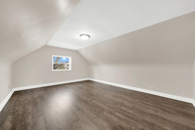 3435 W 71st Pl, Chicago, IL 60629 - additional living space featuring lofted ceiling, dark wood finished floors, and baseboards