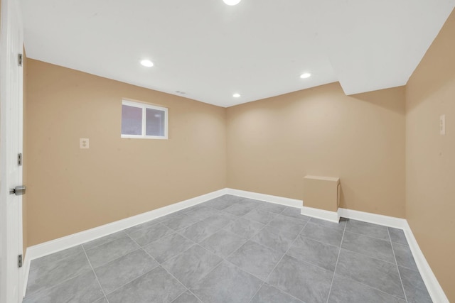 3435 W 71st Pl, Chicago, IL 60629 - finished basement with baseboards, recessed lighting, and tile patterned floors